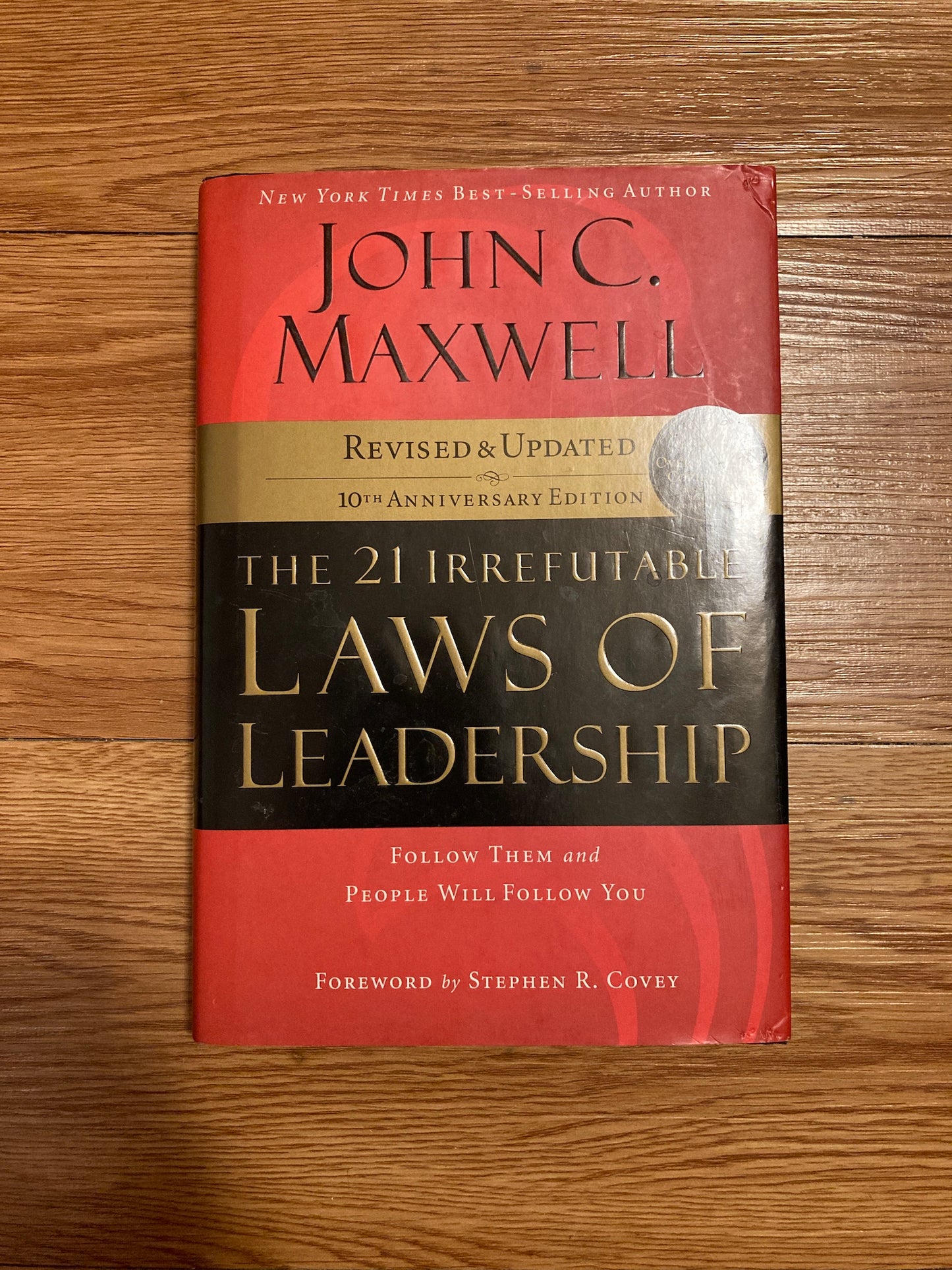 The 21 Irrefutable Laws of Leadership: Follow Them and People